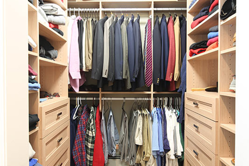 His Section of Master Bedroom Walk-In Closet